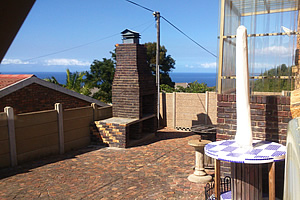 Outdoor braai area with sea view